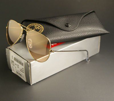 óculos ray ban dourado